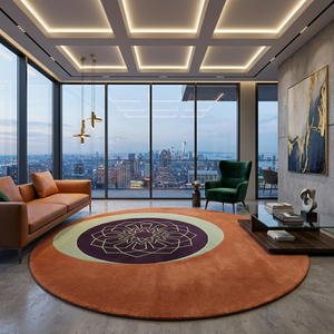 Mandara terracotta mandala round rug on oak flooring with a grey sofa and plum cushions
