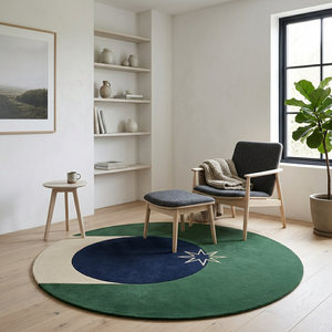 Polaris round rug in a calm reading nook with a grey armchair and plaster walls